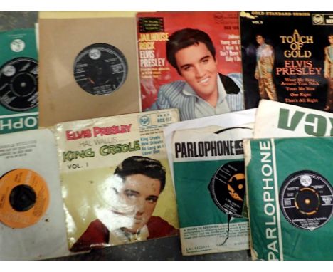 Twelve Elvis Presley singles. UK P&amp;P Group 2 (£20+VAT for the first lot and £4+VAT for subsequent lots) 