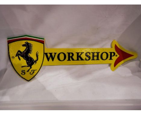 Cast iron Ferrari workshop arrow plaque, L: 45 cm. UK P&amp;P Group 2 (£20+VAT for the first lot and £4+VAT for subsequent lo