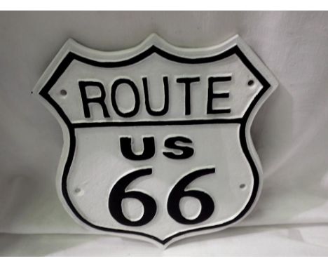 Cast iron Route 66 sign, H: 29 cm. UK P&amp;P Group 1 (£16+VAT for the first lot and £2+VAT for subsequent lots) 