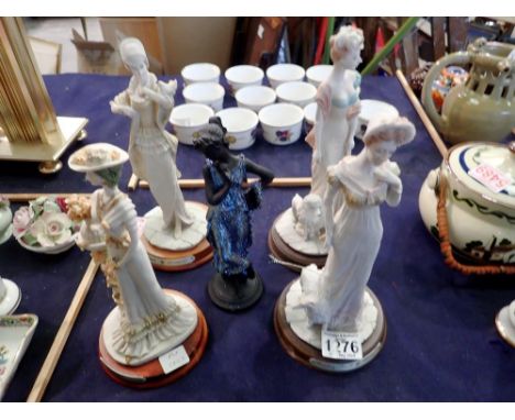 Mixed collection of five lady figurines, largest H: 28 cm. UK P&amp;P Group 3 (£30+VAT for the first lot and £8+VAT for subse