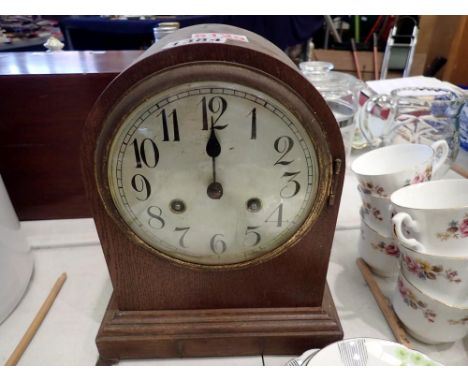Oak domed chiming mantel clock, with key and pendulum. Not available for in-house P&amp;P 