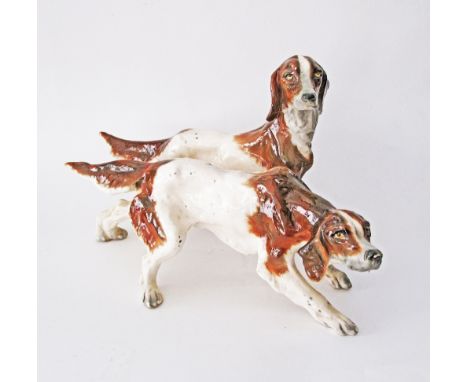 An Italian ceramic group of two hound dogs. L38cm.