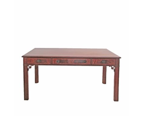 A reproduction Chippendale style mahogany veneered desk with frieze drawers veneered in flame mahogany and feather banding. H