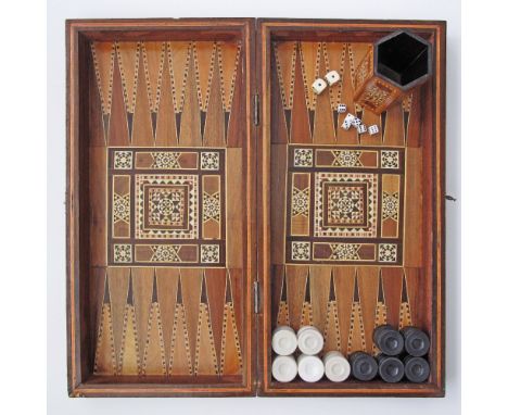 A Syrian khatamkari backgammon / chess deck together with stones, dice and a shaking box. 50X50cm when open.