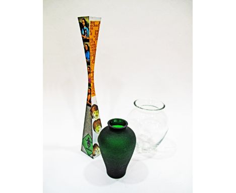 A collection of table accessories comprising a modern candlestick H51cm, a modern clear crystal vase and a green frosted glas
