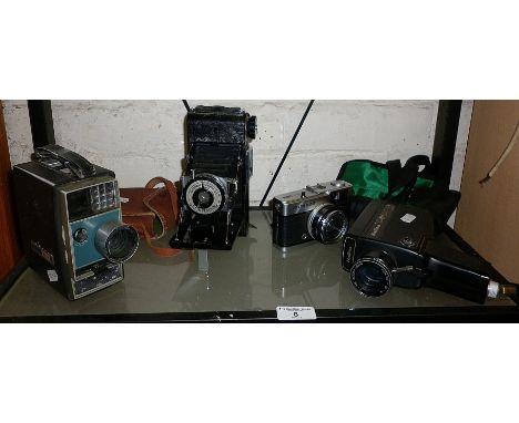 Kodak 8mm film camera, an Olympus Trip 35, a Halina Super Eight and a Kershaw 9-20 King Penguin bellow camera with case