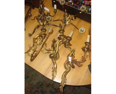 Pair of early 20th c. ormolu two-branch wall lights, a two-branch wall light with carved giltwood back and two brass chandeli