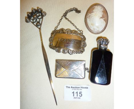 Chinese silver hairpin, silver-topped scent bottle, engraved silver fob stamp case in the form of an envelope, decanter label