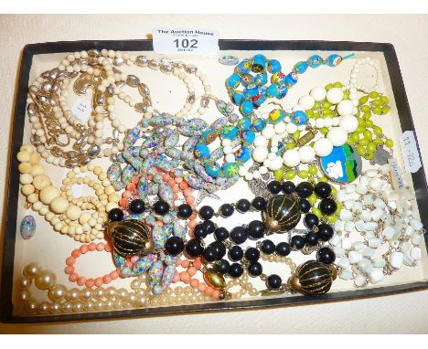 Antique and vintage jewellery including coral, millefiore necklaces and an enamel and silver pendant, signed PG