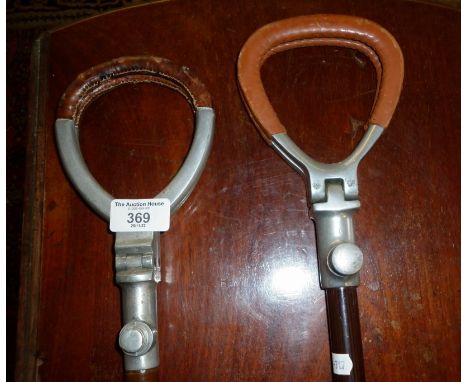 Two vintage shooting sticks