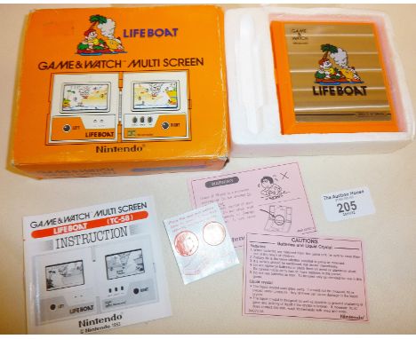 Vintage Nintendo Game and Watch - TC-58 Lifeboat Multi Screen boxed game dated 1983, with instructions etc., and in very good