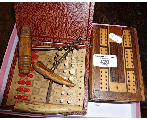 Three old corkscrews (two horn handled), a cribbage box and a travelling chess set