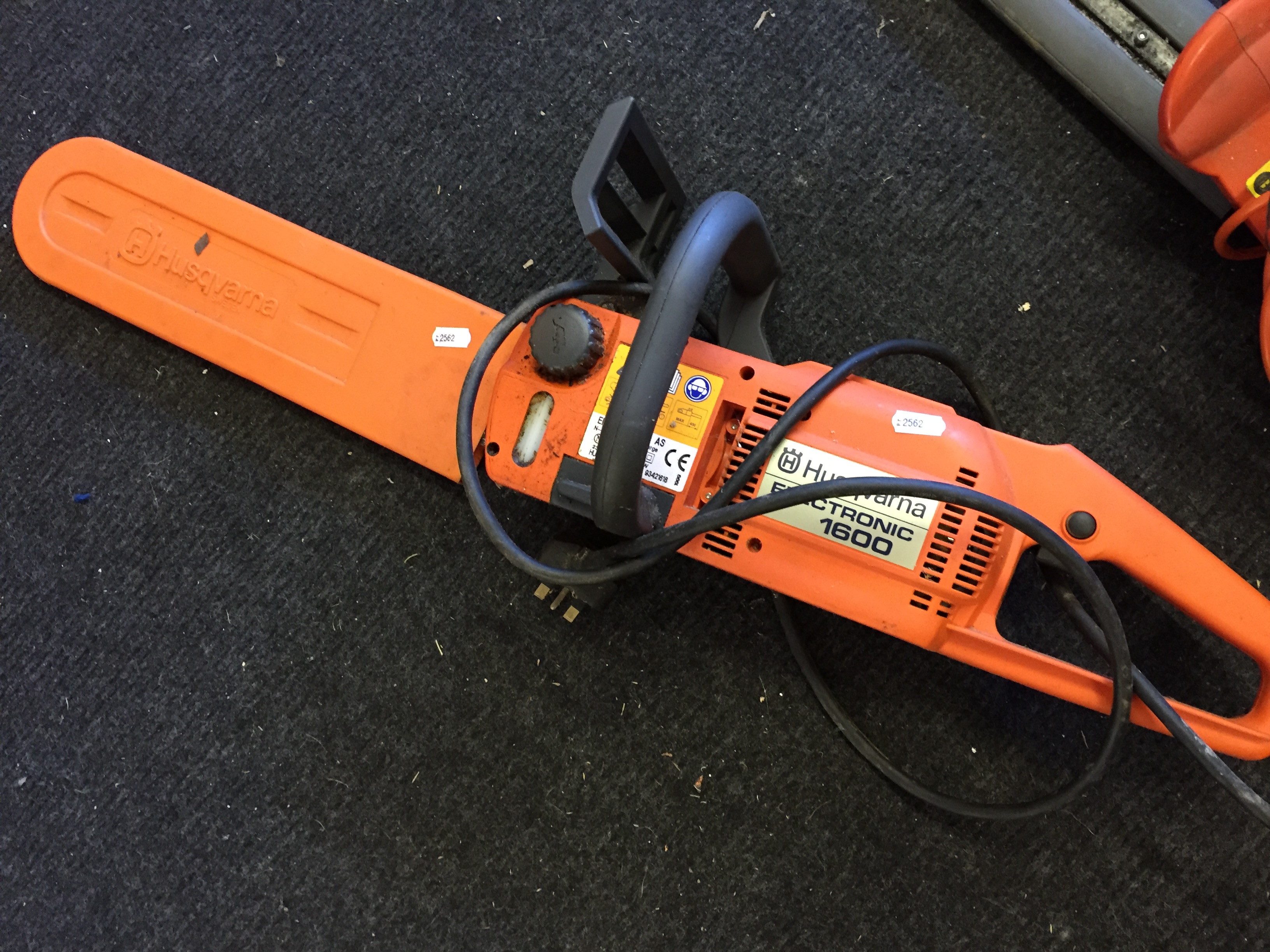A Husqvarna electronic 1600 chain saw.