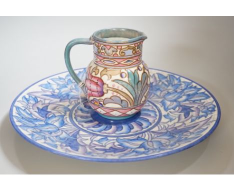 A Burleigh ware Charlotte Rhead lustre jug and a Crown Ducal dish, diameter 32cm