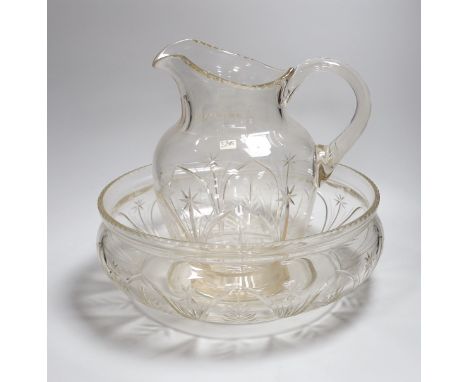 A Victorian/Edwardian cut glass toilet jug and basin,