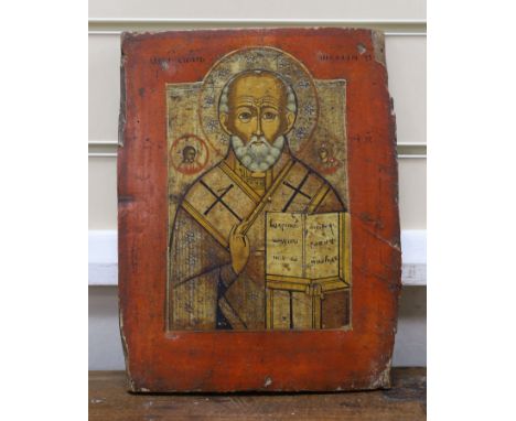 19th century South Russian School, tempera on wooden panel, Icon of St. Nicholas holding the scripture and giving a benedicti