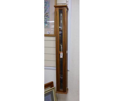 A marine barometer in a mahogany case, 118x17cm