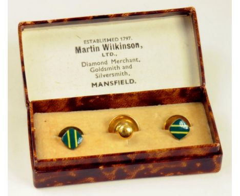 A SET OF THREE GILTMETAL AND ENAMEL STUDS