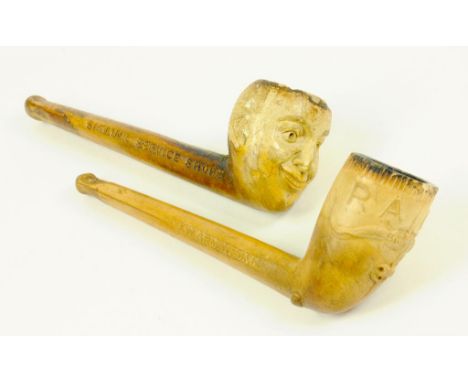 A WALTER WILSON LTD CLAY TOBACCO PIPE IN THE FORM OF A HEAD OF SMILING MAN AND A J.W. ARMSTRONG CLAY TOBACCO PIPE BOWL MOULDE