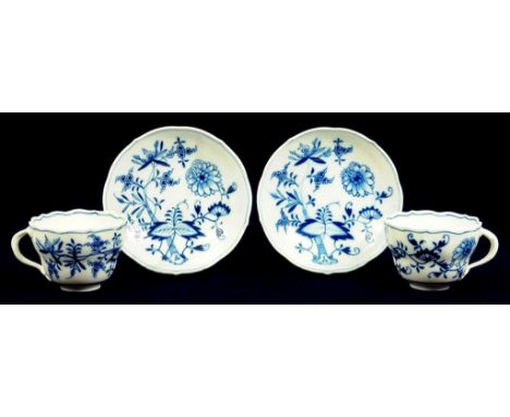 TWO MEISSEN ONION PATTERN TEACUPS AND SAUCERS, CANCELLED CROSSED SWORDS (ONE SAUCER BROKEN AND RESTUCK)  