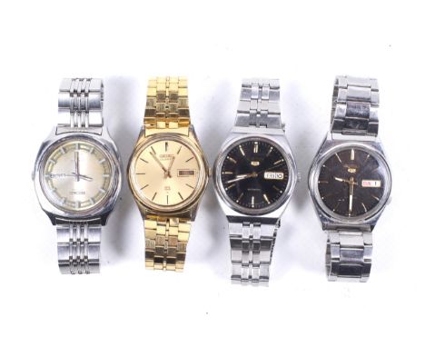 Four Seiko gentleman's stainless steel bracelet watches. Comprising; Seiko 5 Automatic the black dial with raised gilt baton 