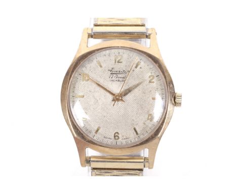 Everite, a gentleman's 9ct gold cased bracelet watch, circa 1956. No.756889, the textured dial with raised gilt baton indicat