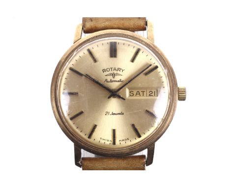 Rotary, a gentleman's 9ct gold cased automatic day/date wrist watch, circa 1973(?). The brushed golden dial with raised gilt 