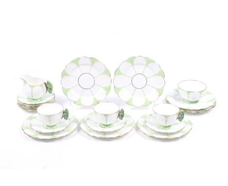 An Aynsley Art Deco part tea service. Comprising three cups, eight saucers, eight plates, milk jug and sugar bowl. All decora