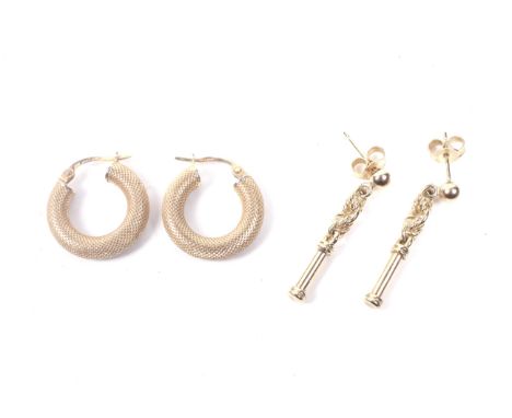 Two pairs of 9ct gold earrings. Comprising; a pair of modern Italian 9ct gold textured hollow-hoop earrings with post 2000 Bi