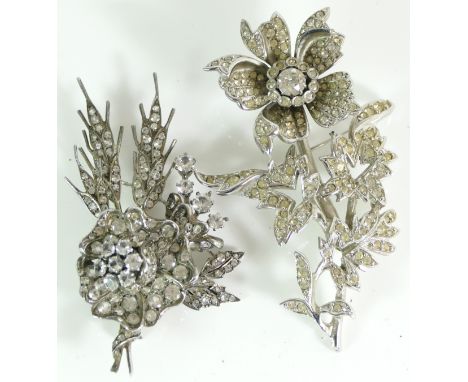 A silver floral spray paste set brooch, 7.5cm, 30gm, together with a vintage En tremblant paste set floral brooch. 