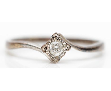 A 9ct white gold illusion set brilliant cut diamond solitaire ring, stated weight 0.10cts, size Q, 1.8gm. 