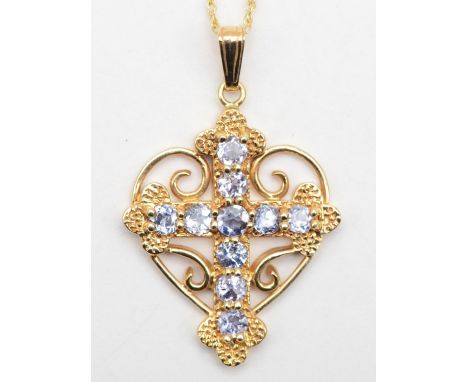 A 9ct gold tanzanite cross heart pendant, 26mm, on chain, 46cm, 2.3gm. 