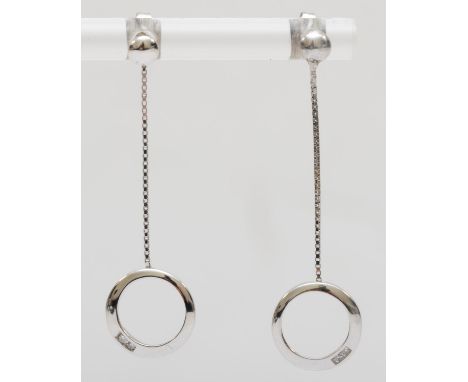 A 9ct white gold diamond hoop and chain drop earrings, 4cm, 1.1gm. 