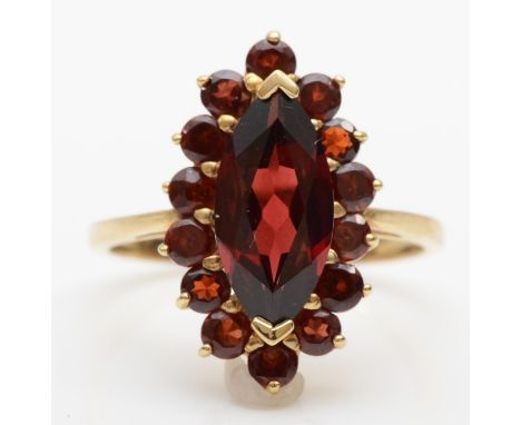 A 9ct gold garnet set marquise cluster ring, size S-T, 4gm. 