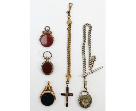 Three base metal watch fobs set with carnelian and blood stone, a gold plated chain with agate cross and a heart compass on c