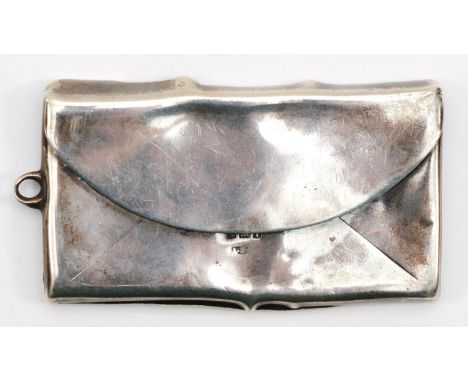 A George V silver stamp case, Birmingham 1910, in the form of a envelope, 6 x 3cm, 16gm. 