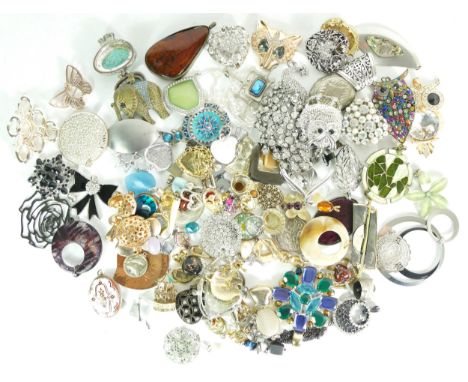 A group of modern and vintage costume pendants, 1500gm. 