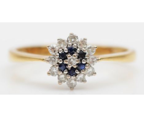 An 18ct gold sapphire and diamond cluster ring, size L, 2.1gm. 