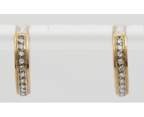 A 9ct gold pair of diamond hoop earrings, 1.5cm , 2.1gm. 