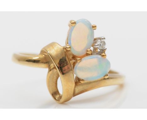 A 9ct gold diamond and opal abstract ring, size O, 2.7gm. 