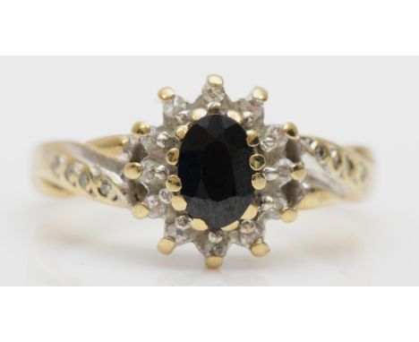 A 9ct gold sapphire and diamond cluster ring, size K-L, 3.2gm. 