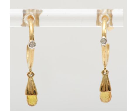 A 9k gold pair of diamond and yellow sapphire hoop earrings, 2.5cm, 1.7gm. 