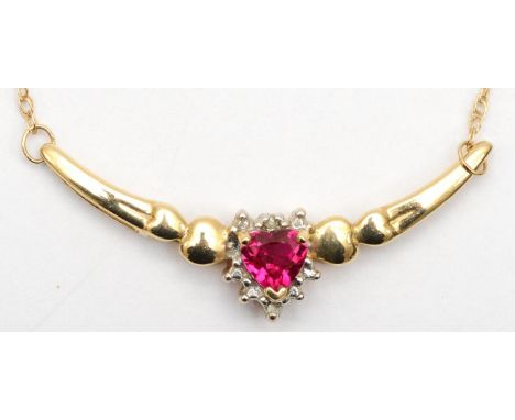 A 9ct gold diamond and heart cut synthetic ruby necklace, 42cm, 2.3gm. 