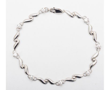 A 9KT white gold bracelet set with cubic zirconia, 19cm, 2.9gm. 