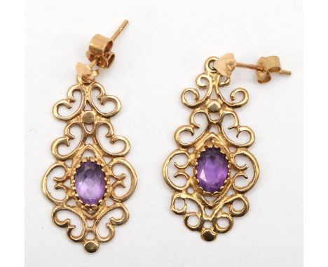 A 9ct gold pair of amethyst open work drop earrings, 3cm, 2.1gm. 