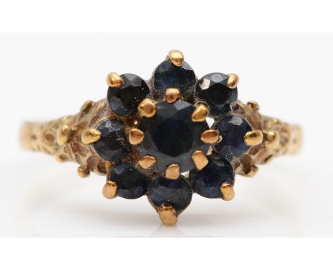 A 9ct gold sapphire cluster ring, K, 1.8gm 