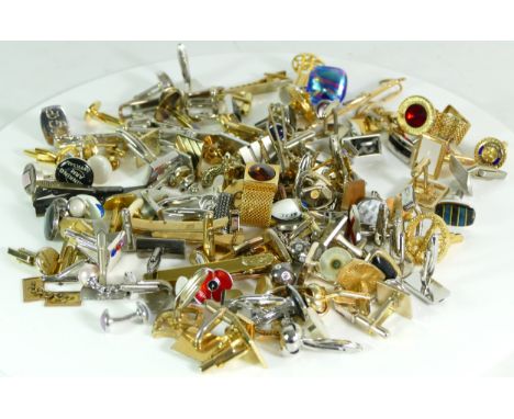 A collection of accessories to include tie pins, cufflinks and tie slides, 750gm. 