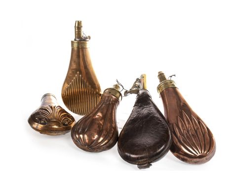 FOUR VICTORIAN COPPER POWDER FLASKS, along with one leather shot powder flask, two gun cleaning rods and a reproduction carbi