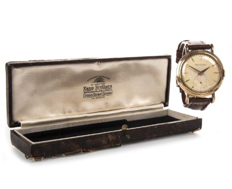 GEORGE CHARLTON KILLEY - HIS JAEGER LECOULTRE NINE CARAT GOLD WRIST WATCH, the round dial with applied gold coloured tapered 
