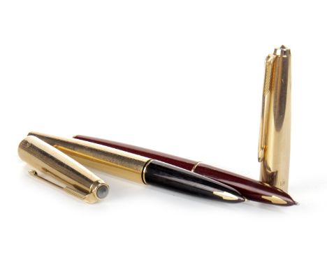 PARKER 61 FOUNTAIN PEN, the maroon and gold plated body 13.5cm long overall, along with a gold plated Parker fountain pen, ea